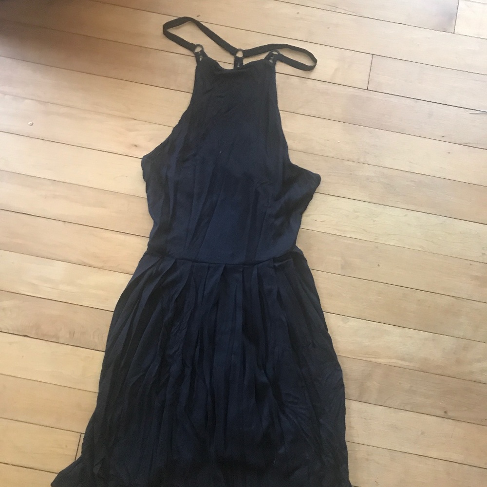 Black mini dress, intricate back design